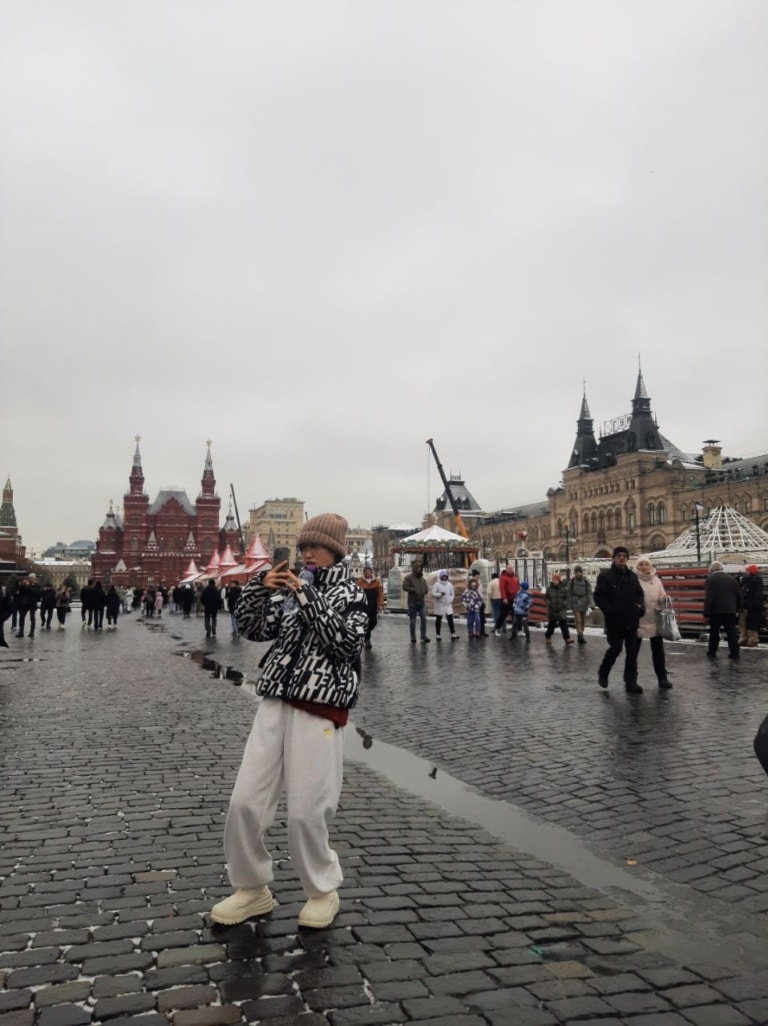 Chinese take photos on Red Square during a tour