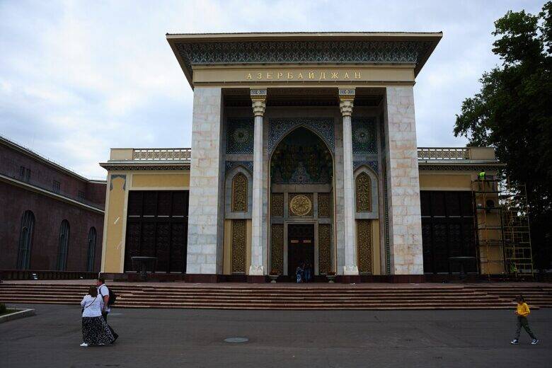 The façade of the Azerbaijan Pavilion at VDNKh: a tall portal, ornamentation and scaffolding on the right.