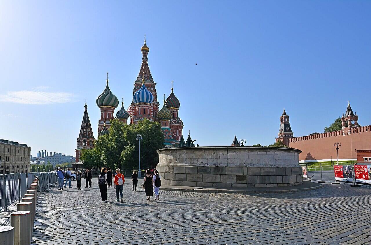 The circular stone platform of Lobnoye Mesto in front of the Cathedral of the Intercession, with the Kremlin wall on the right