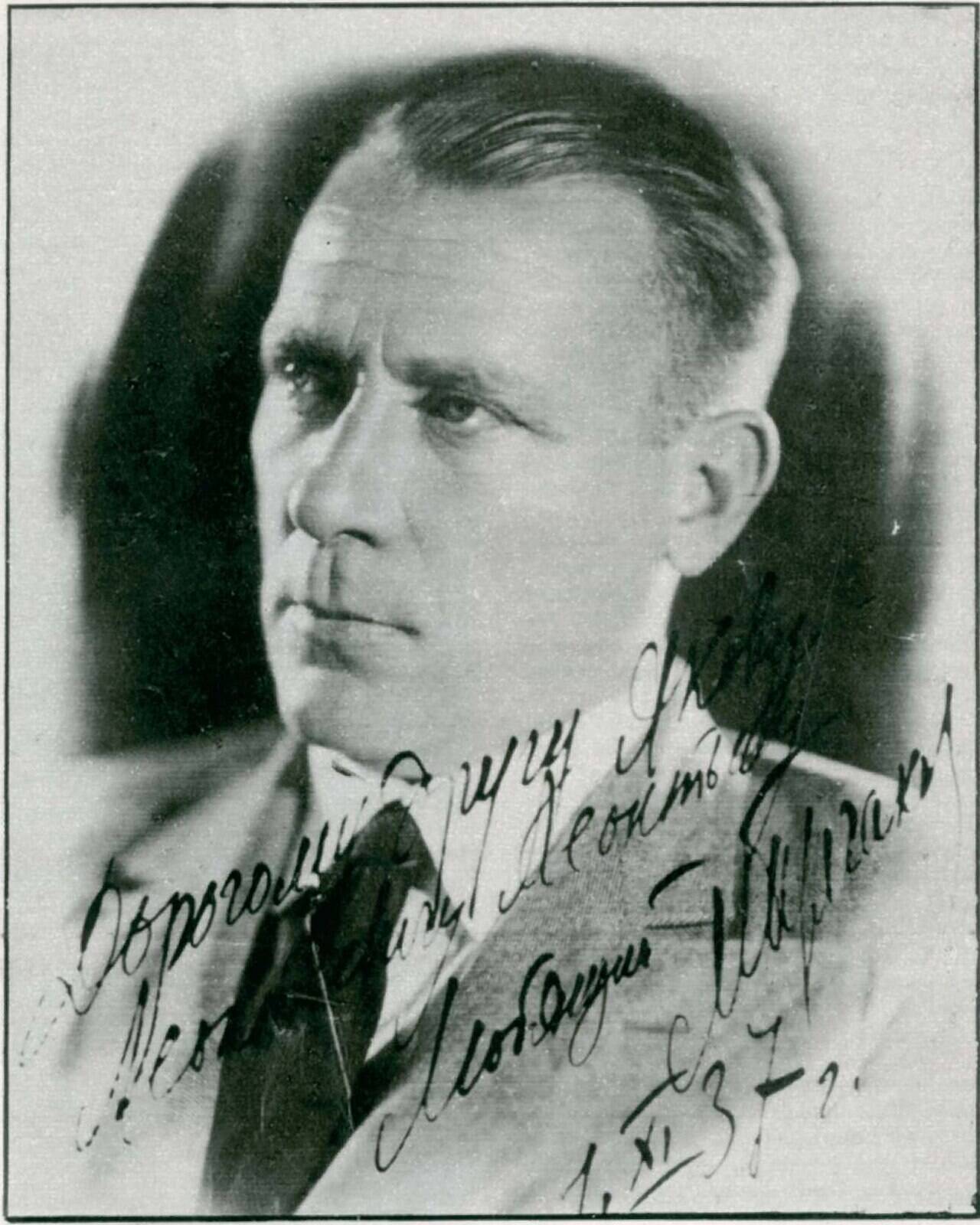Mikhail Bulgakov in a 1930 photograph bearing a handwritten inscription dated 1 November 1937