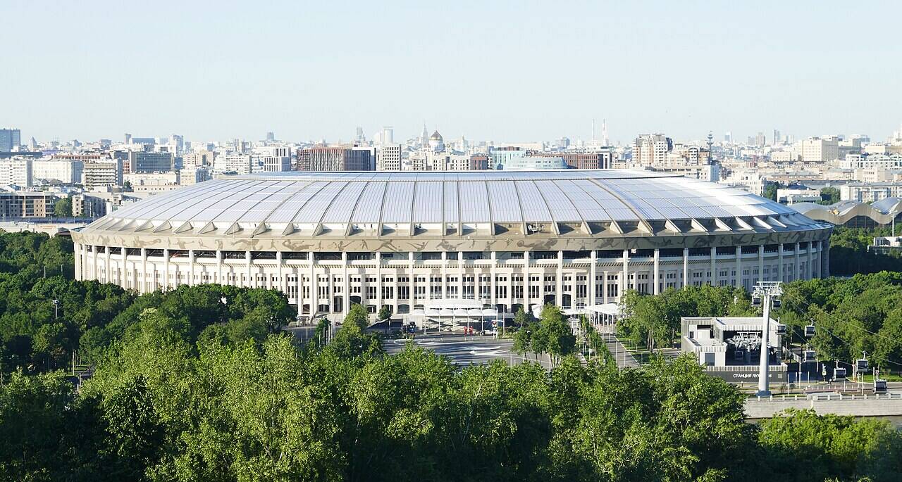 Daytime view of Luzhniki Stadium with its exterior colonnade and oval roof