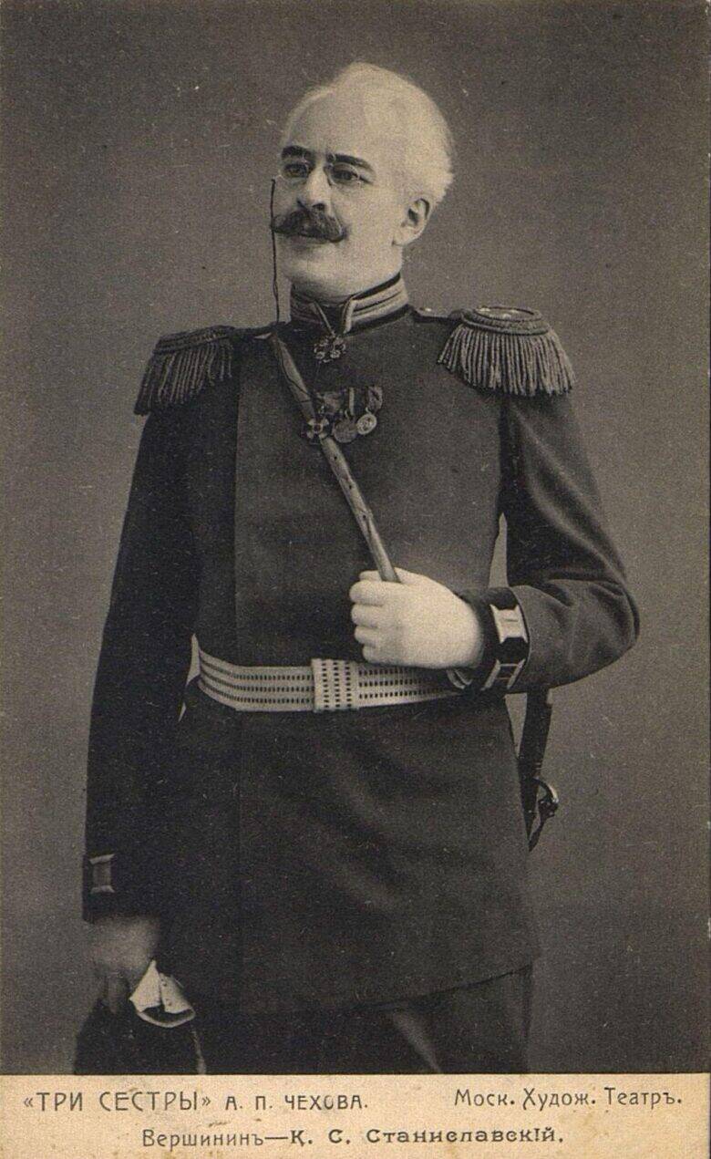 Stanislavsky as Vershinin: wearing a uniform with shoulder boards, a moustache and pince-nez; a theatrical caption is printed at the bottom of the card.